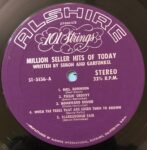 101StringsPlayMillionSellerHitsOfToday101StringsUsedVinylLPRecord_image0_1701089371036.jpg