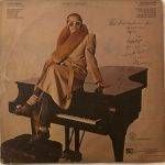 HereAndThereEltonJohnUsedVinylLPRecord_image0_1704289454037.jpg