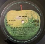 TheBeatlesTheBeatlesUsedVinylLPRecord_image0_1708270804825.jpg