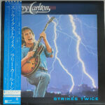 Strikes Twice = ストライクス・トワイス - Larry Carlton = ラリー・カールトン* - LP - Pre Owned Vinyl (Arrives in 21days)