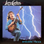 Strikes Twice - Larry Carlton - LP - Pre Owned Vinyl (Arrives in 21days)